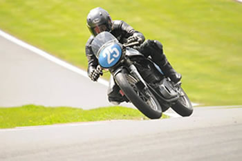 Andy Molnar tips into Hall Bends on his standard 350cc Molnar Manx (Picture Courtesy Leanne Pennell Photography)